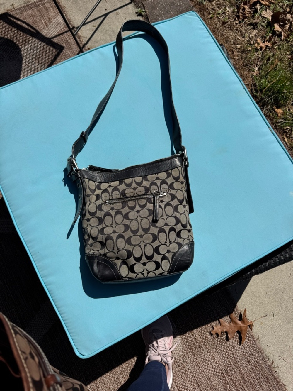 Coach Monogram Crossbody Bag in Black and Tan. Crossbody bag.